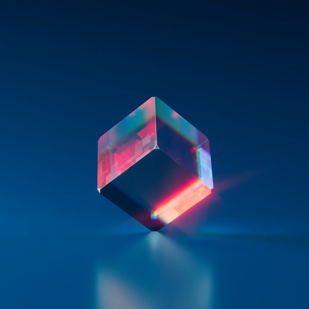 a cube balanced on a flat surface